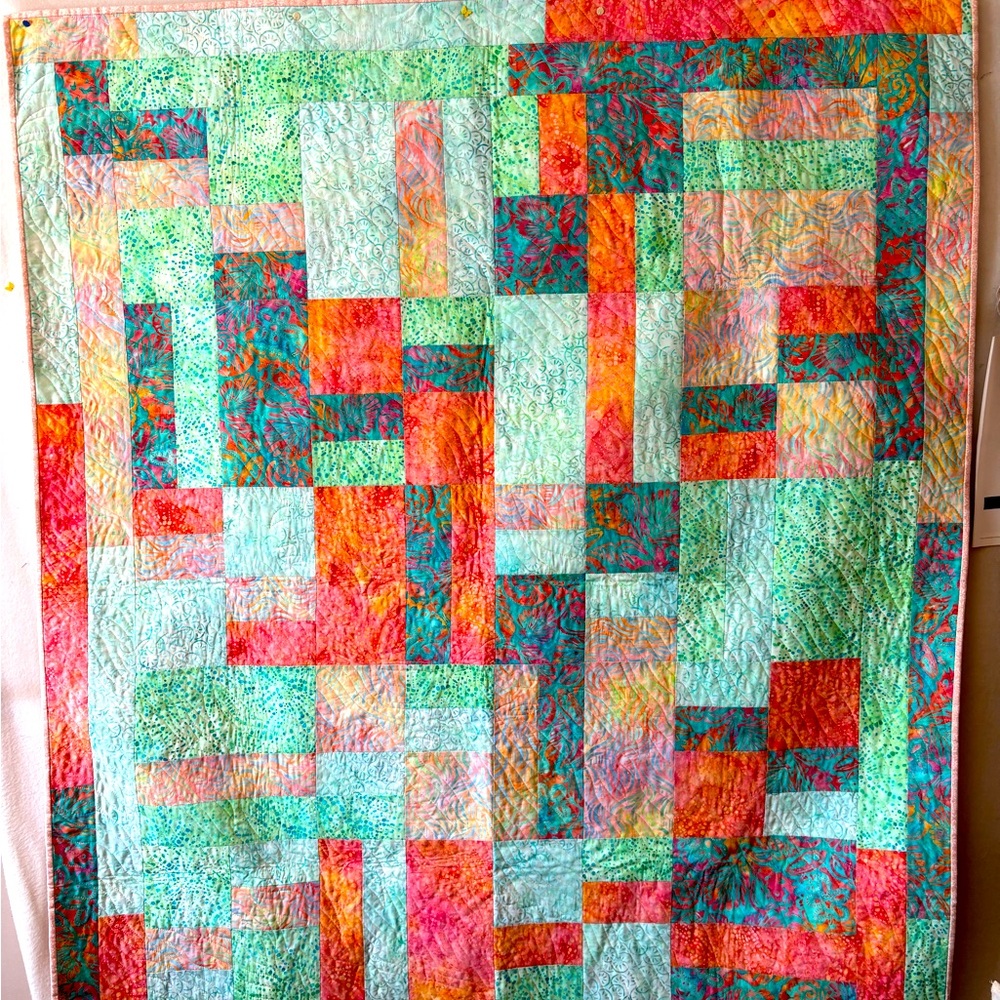 Hand made quilted lap throw or wall hanging.